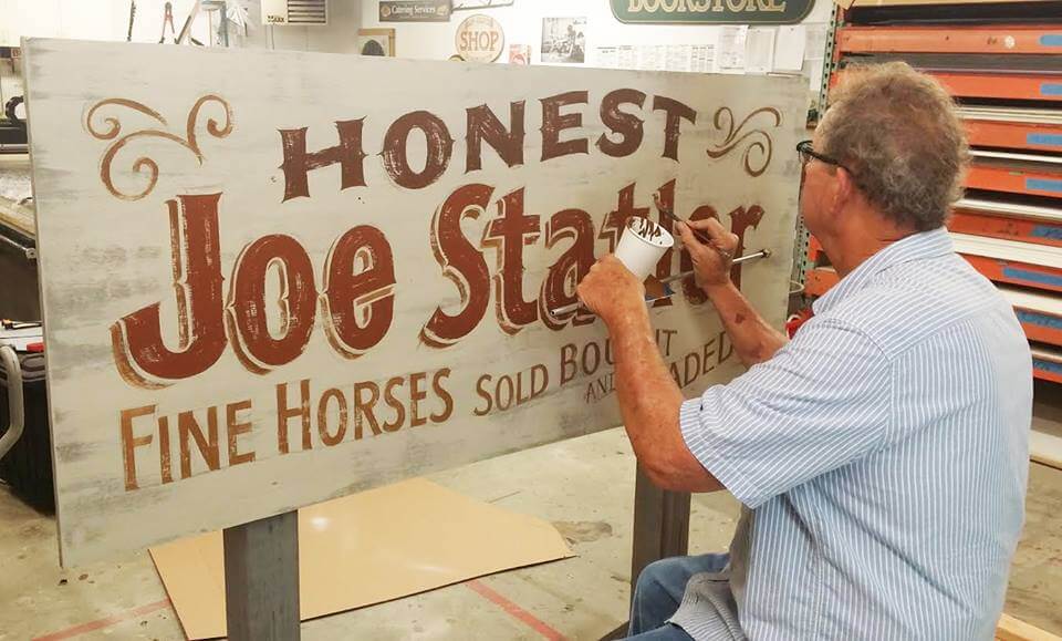 Hand painted sign for a Toyota commercial