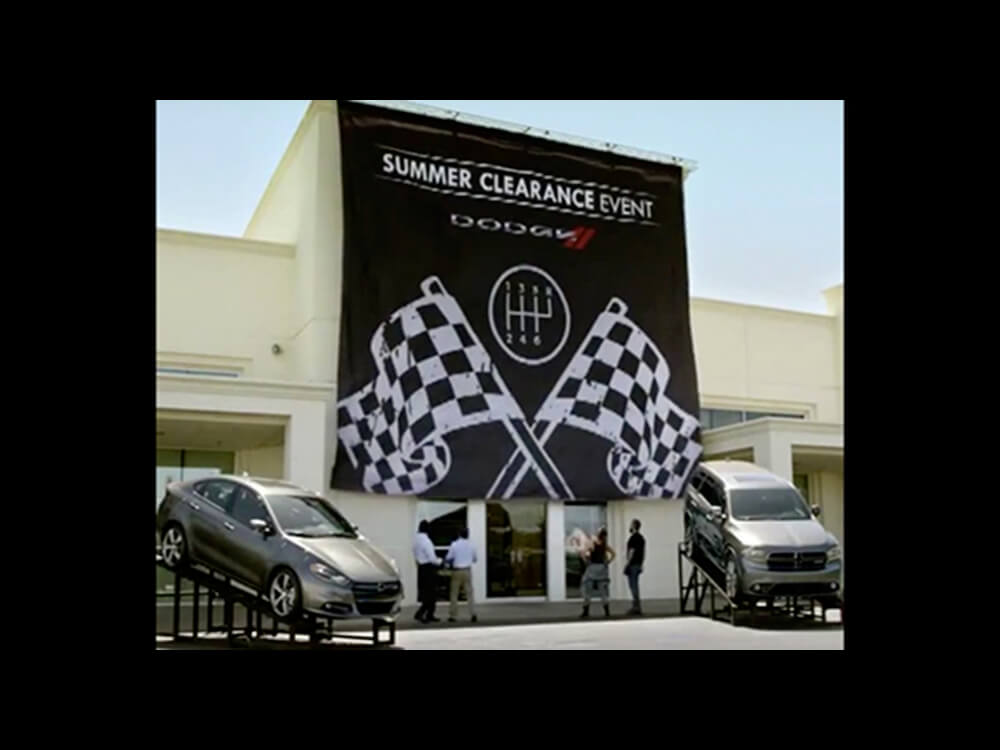 An enormous banner for the Dodge Summer Clearance event