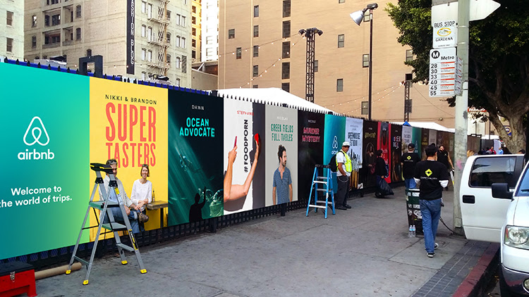 A massive fence wrapping we created for Airbnb Open